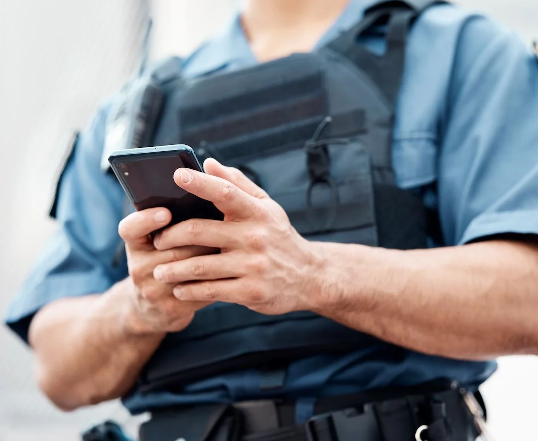 Policeman with Phone